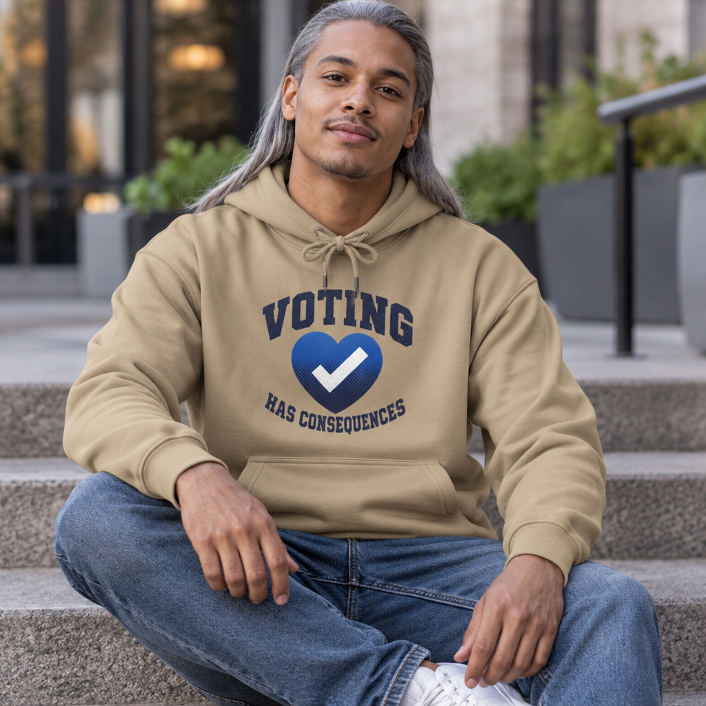 Model seated on outdoor steps wearing a tan Voting Has Consequences hoodie.